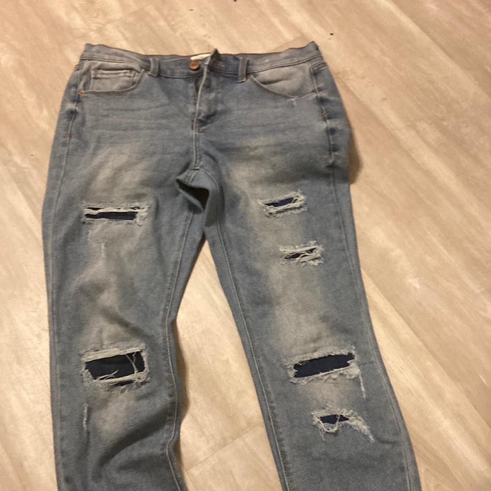 Distressed Blue Jeans for Women and have never been worn
